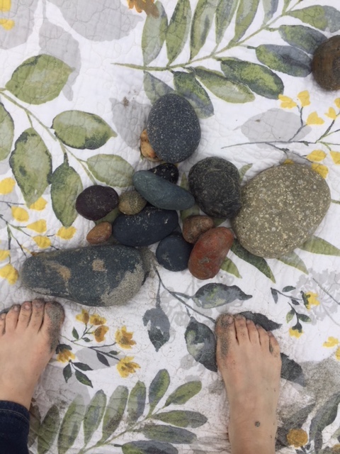 a rock on his blanket